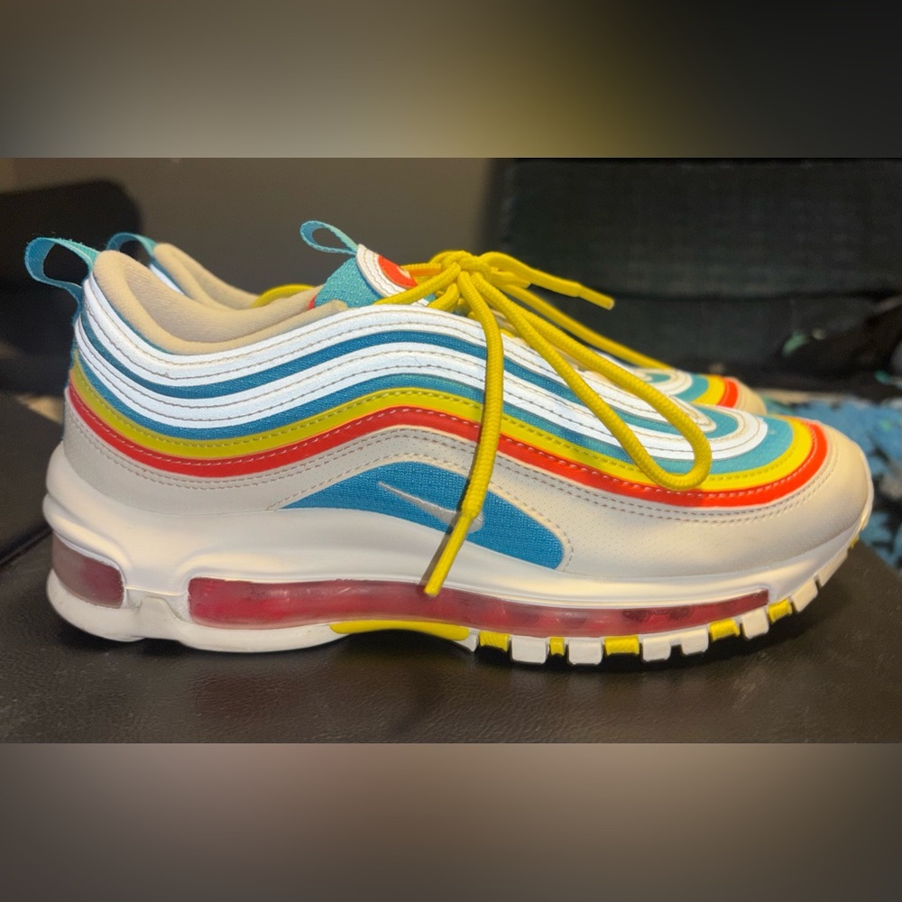 Nike Kids Sneakers with Yellow, Blue, and Red Accents